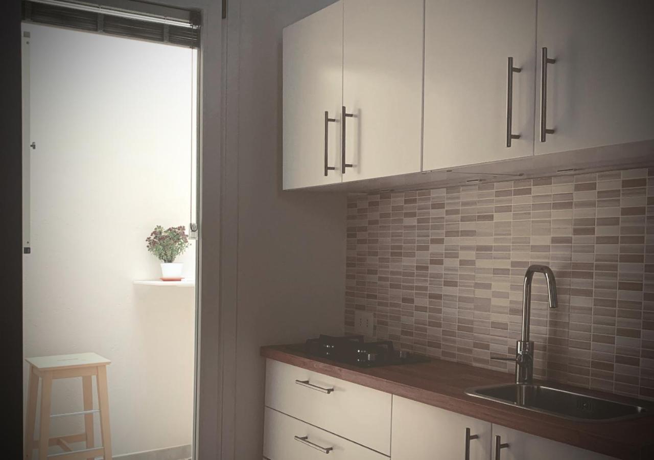 Satyria Apartments Taranto Bagian luar foto